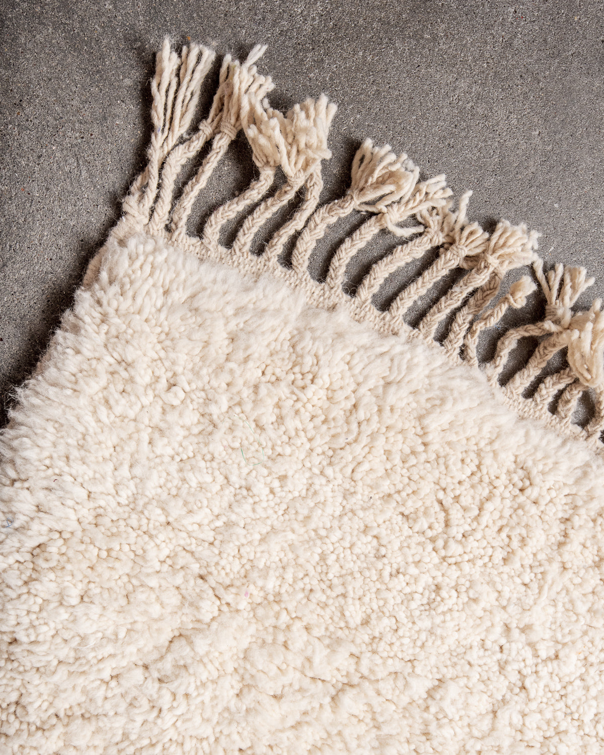 Modern, designer, handcrafted Berber rug from Morocco. Beniourain carpet with minimalist design, natural wool pile and a fluffy texture.